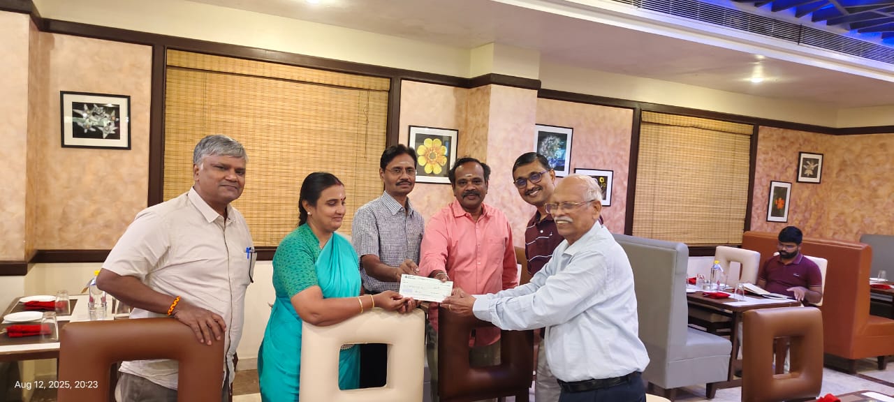 Dr V Swaminathan handing over the Cheque to Mrs Mahalakshmi Sankar, Treasurer & Mr Nadarajan, Secretary - NIQR Pondicherry Branch